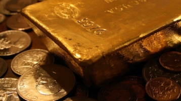 Hoe werkt een herwaardering van goud?